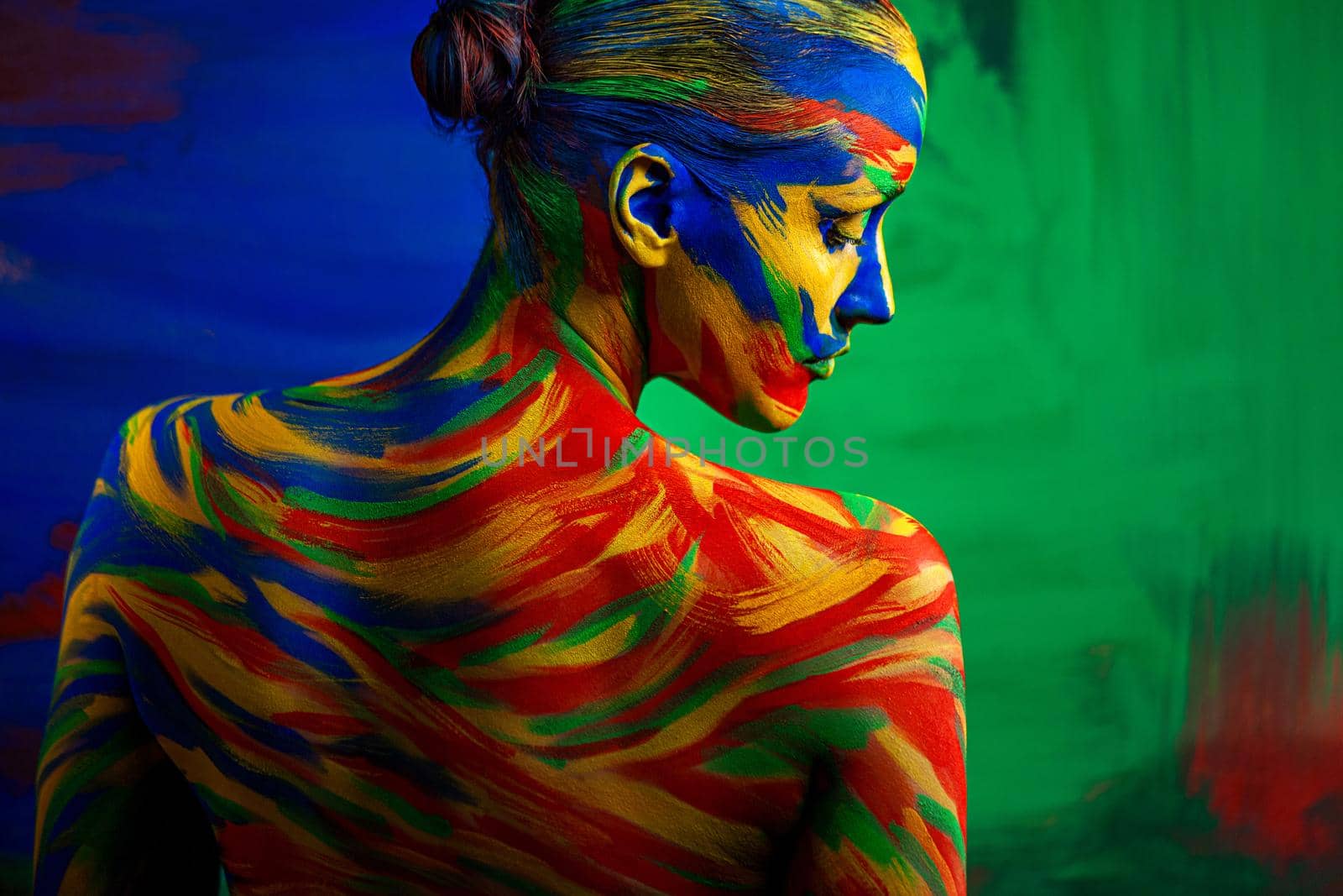 Art fashion makeup. Color face of woman for inspiration. Abstract portrait of the bright beautiful girl with colorful make-up and bodyart. by MikeOrlov