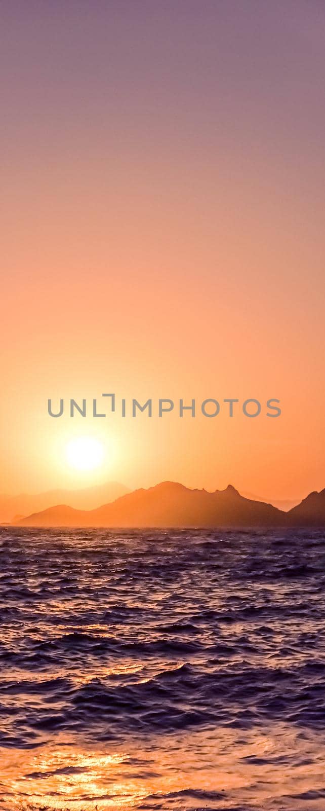 Summer sunset at the Mediterranean sea coast, seascape and mountain view by Anneleven