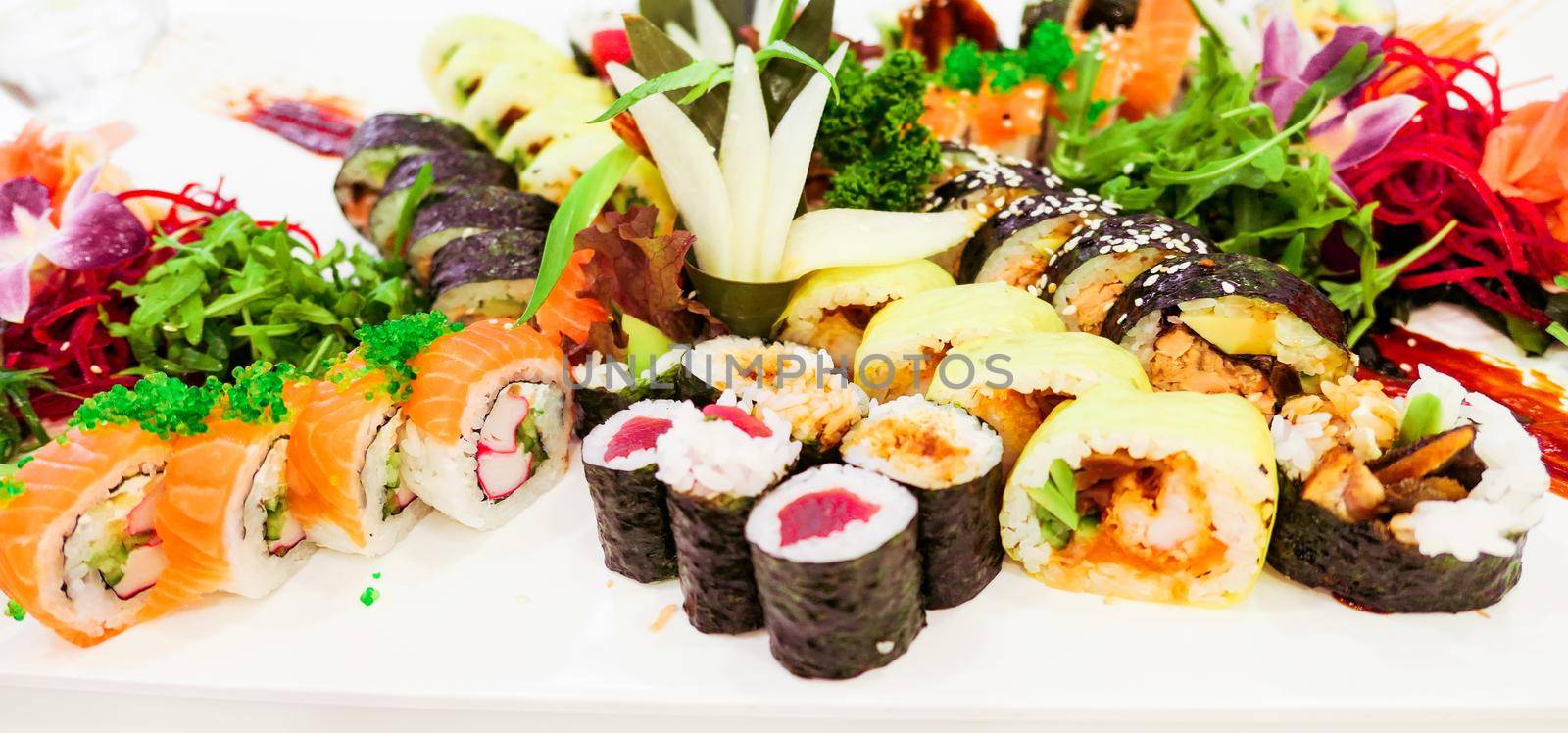 Food, travel and healthy eating concept - Japanese sushi in a restaurant at lunch time, asian cuisine