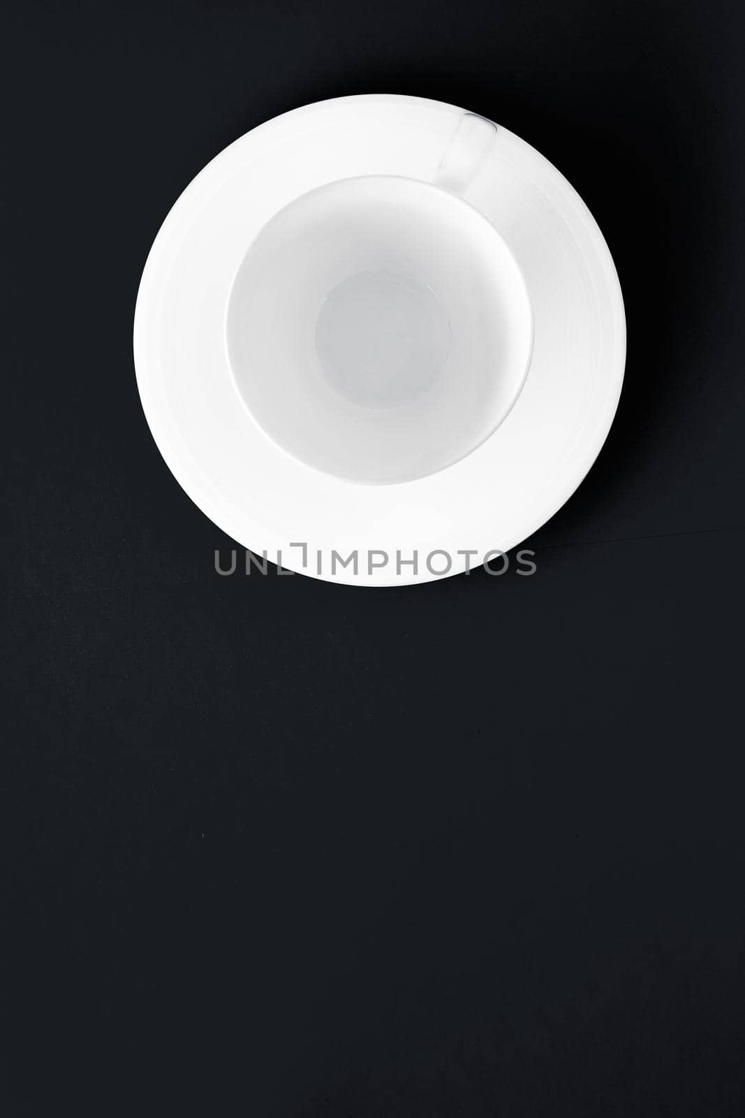 White tableware crockery set, empty cup on black flatlay background by Anneleven