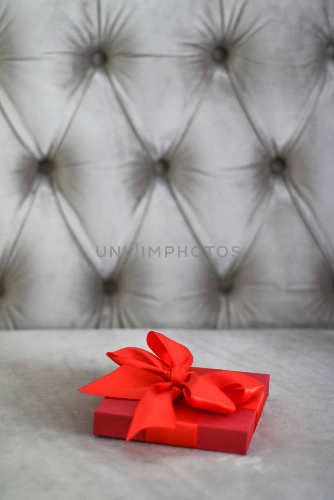 Wedding present, shop sale promotion and love celebration concept - Luxury holiday red gift box with silk ribbon and bow, christmas or valentines day decor