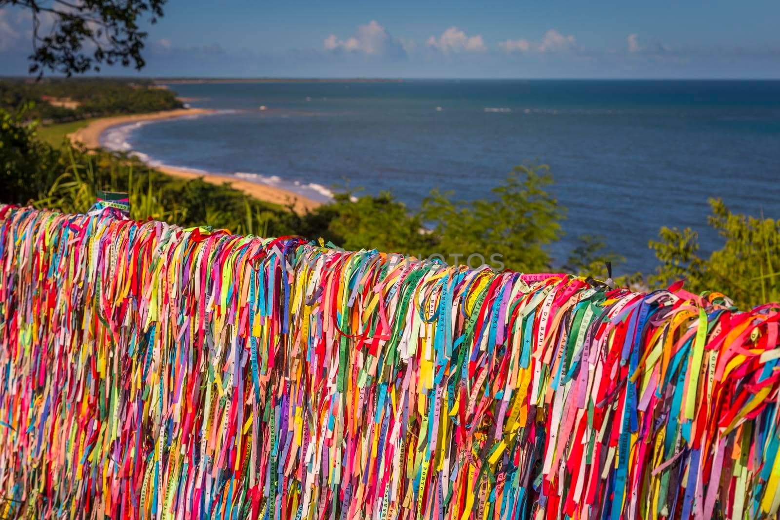 Beach and Colorful Lord of Bonfim ribbon tapes symbol of faith and good luck in Trancoso, BAHIA