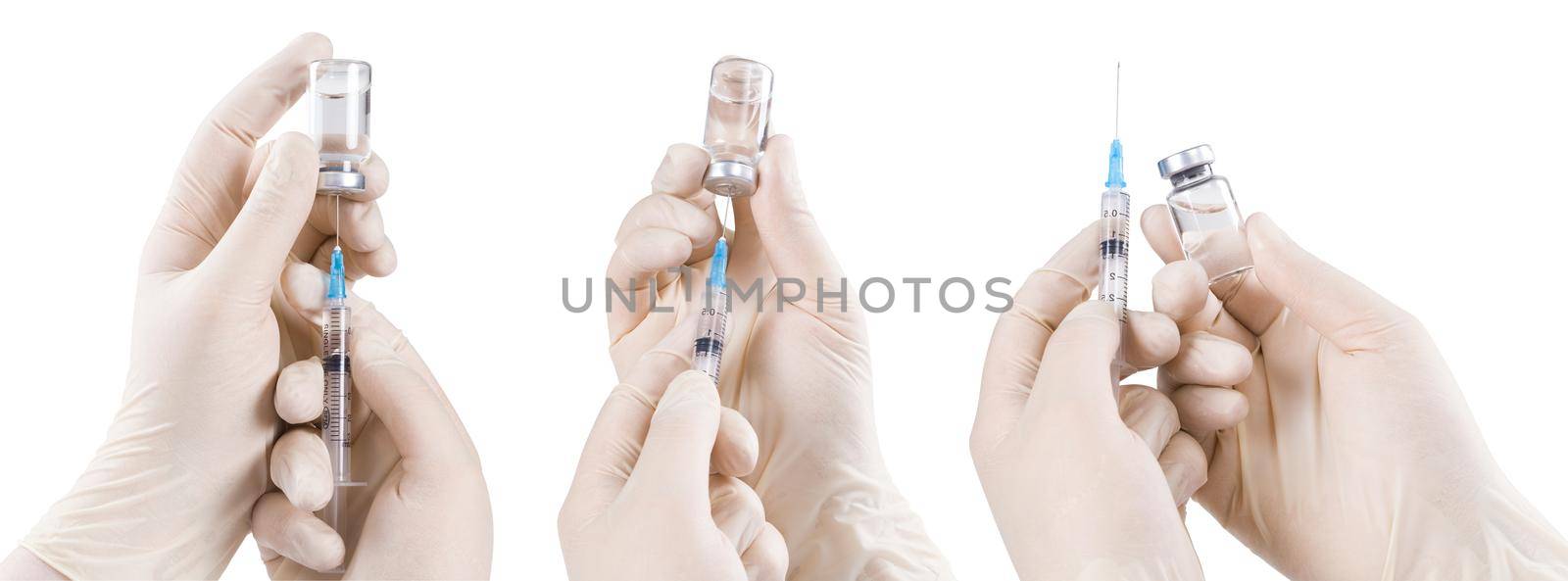 Hand holding syringe with vaccine against corona virus. by Taut