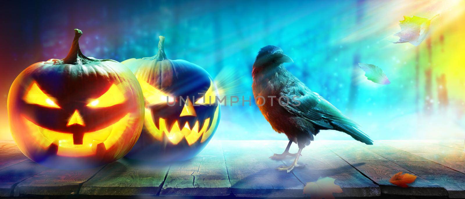 Horror background with scary crow in the darkness by Taut