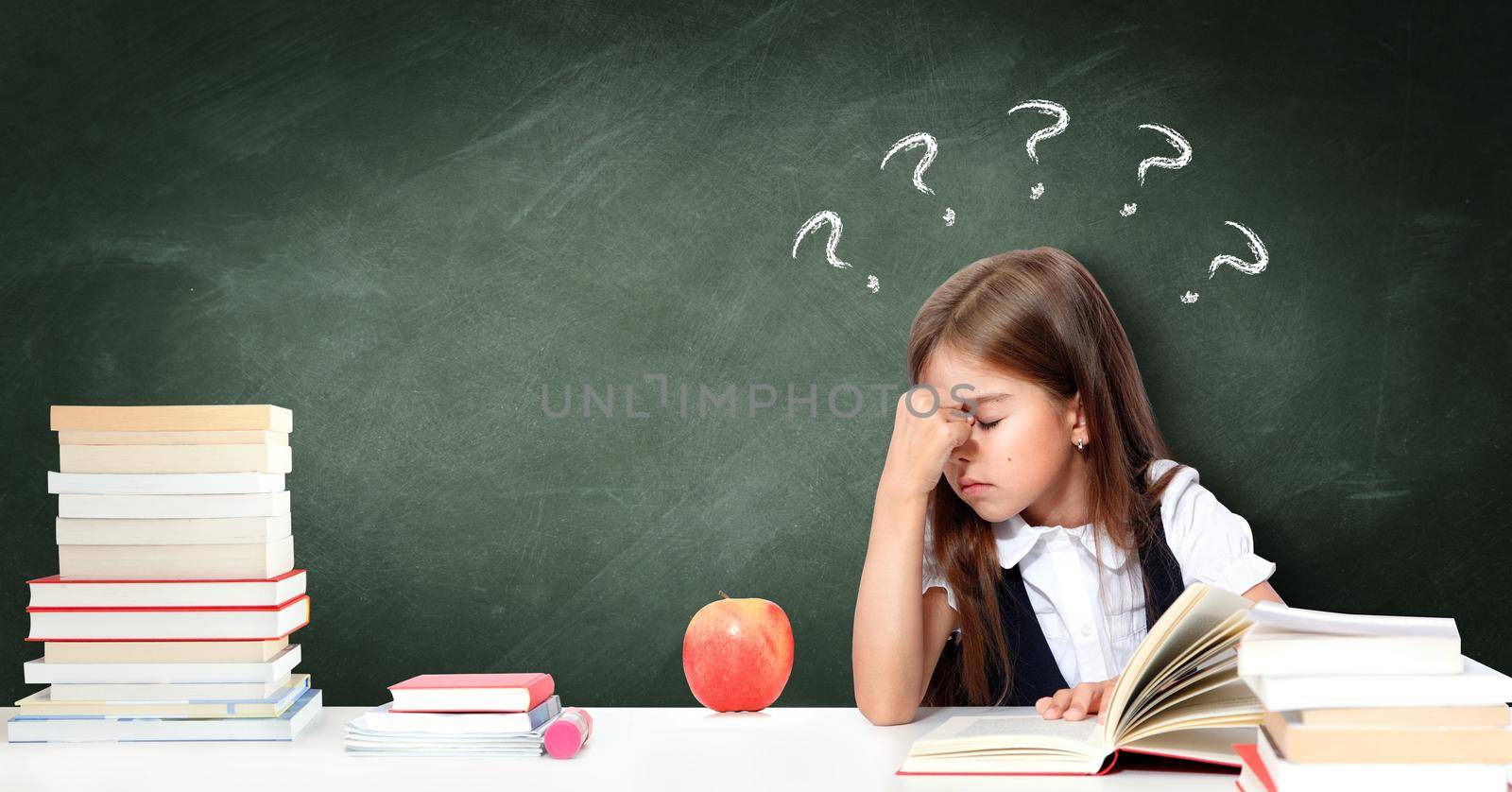 Frustrated and unhappy teen girl at school. by Taut