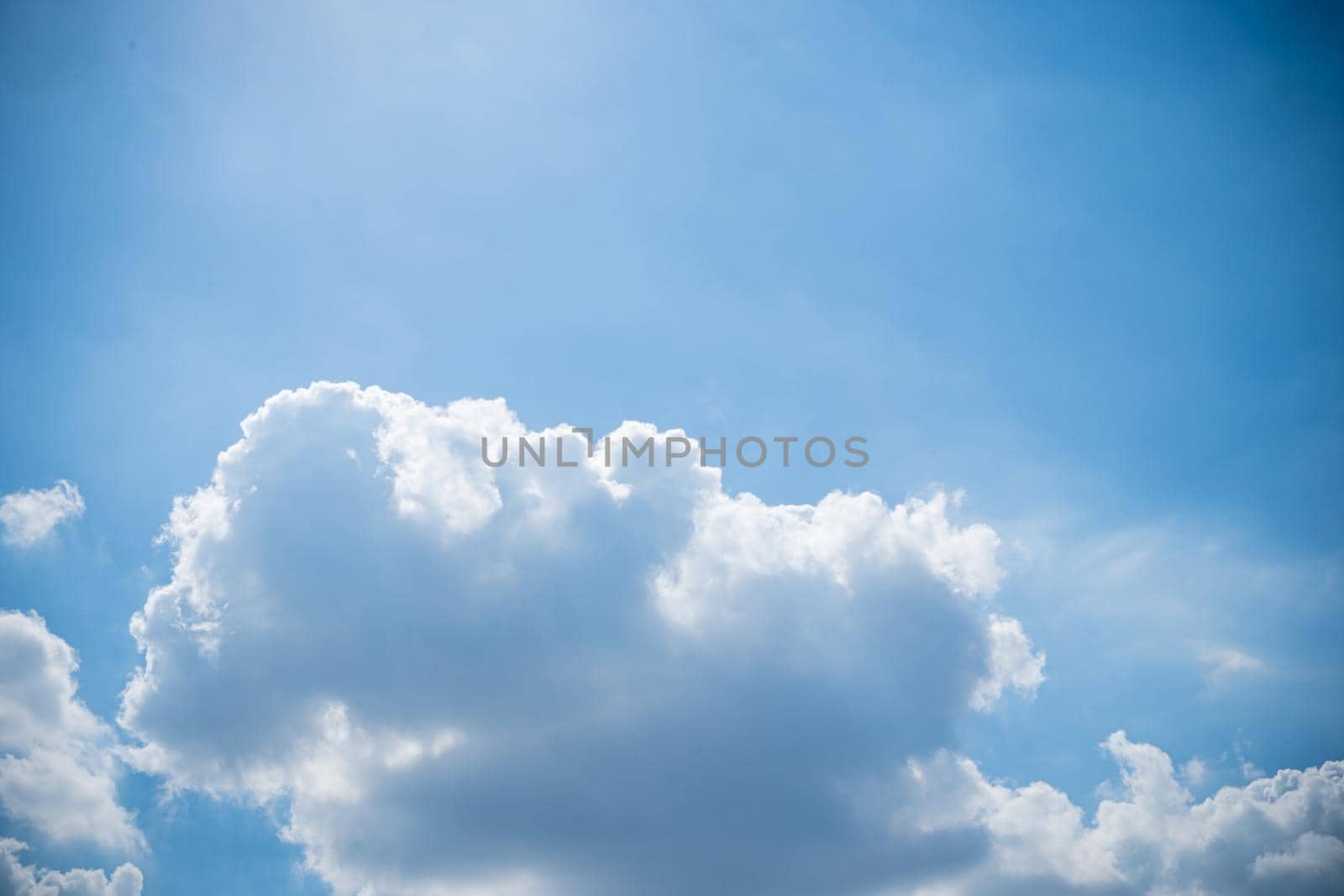 white fluffys clouds sky background with blue sky background for copy space