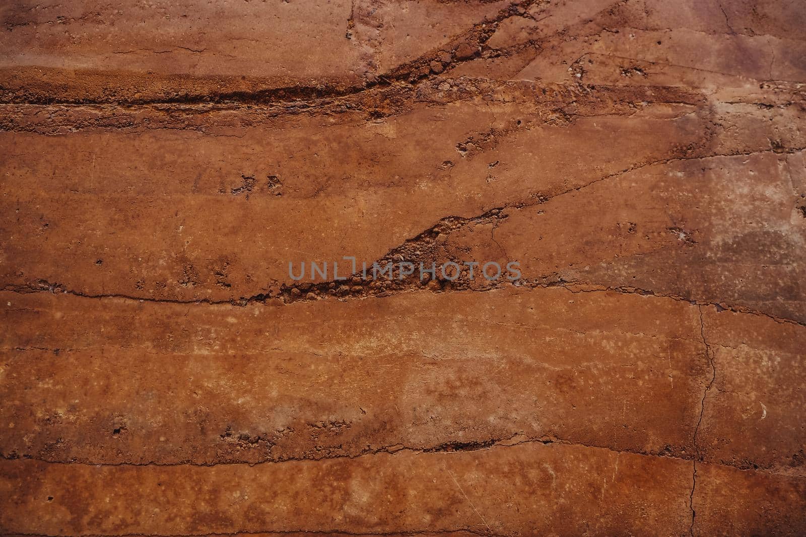 Soil texture layers for natural background. Abstract nature Soil patterned layer of clay soil for the background. Layer of dry soil cracks natural texture and background . Cracked and barren ground,dry soil textured background,form of soil layers,its colour and textures,texture layers of earth for background