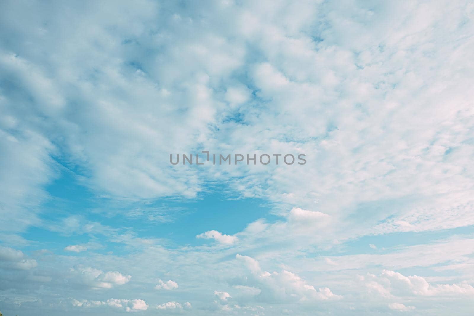 Beautiful white fluffys clouds sky background with blue sky background