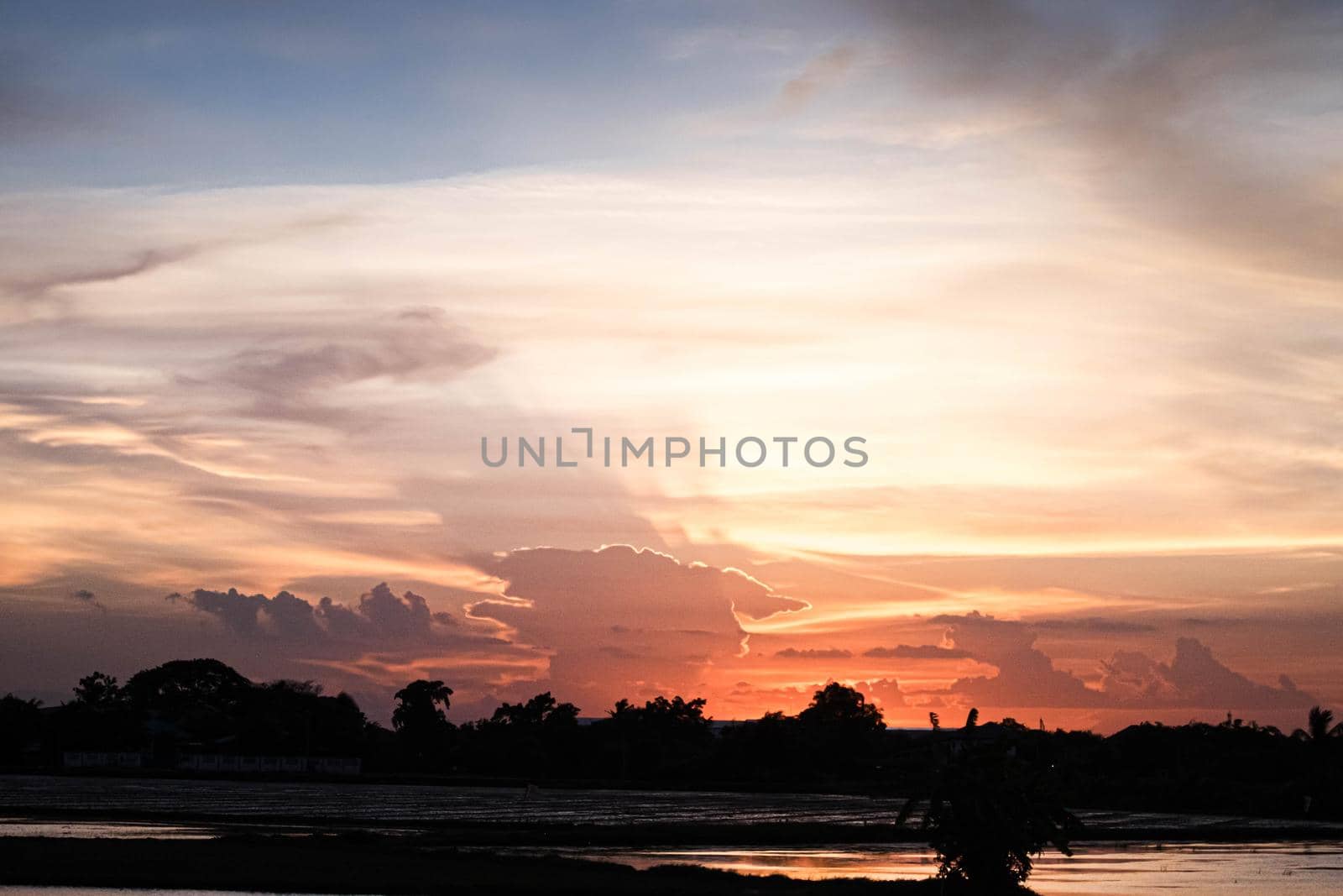 Beautiful sunset sky above clouds.  orange sunset sky. Beautiful sky.Dramatic red yellow pastel color at sunset