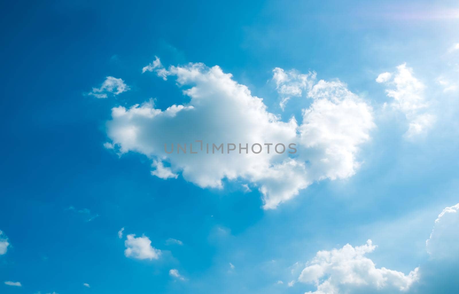 white fluffys clouds sky background with blue sky background for copy space. by Petrichor