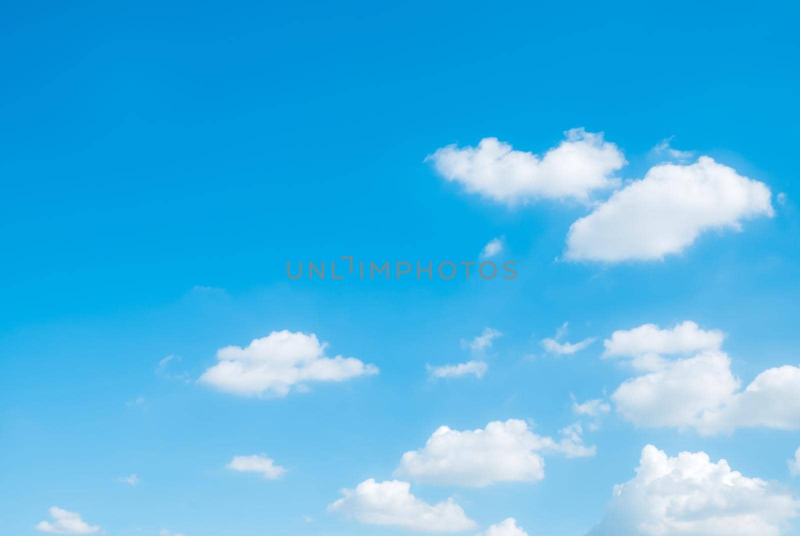 white fluffys clouds sky background with blue sky background for copy space. by Petrichor