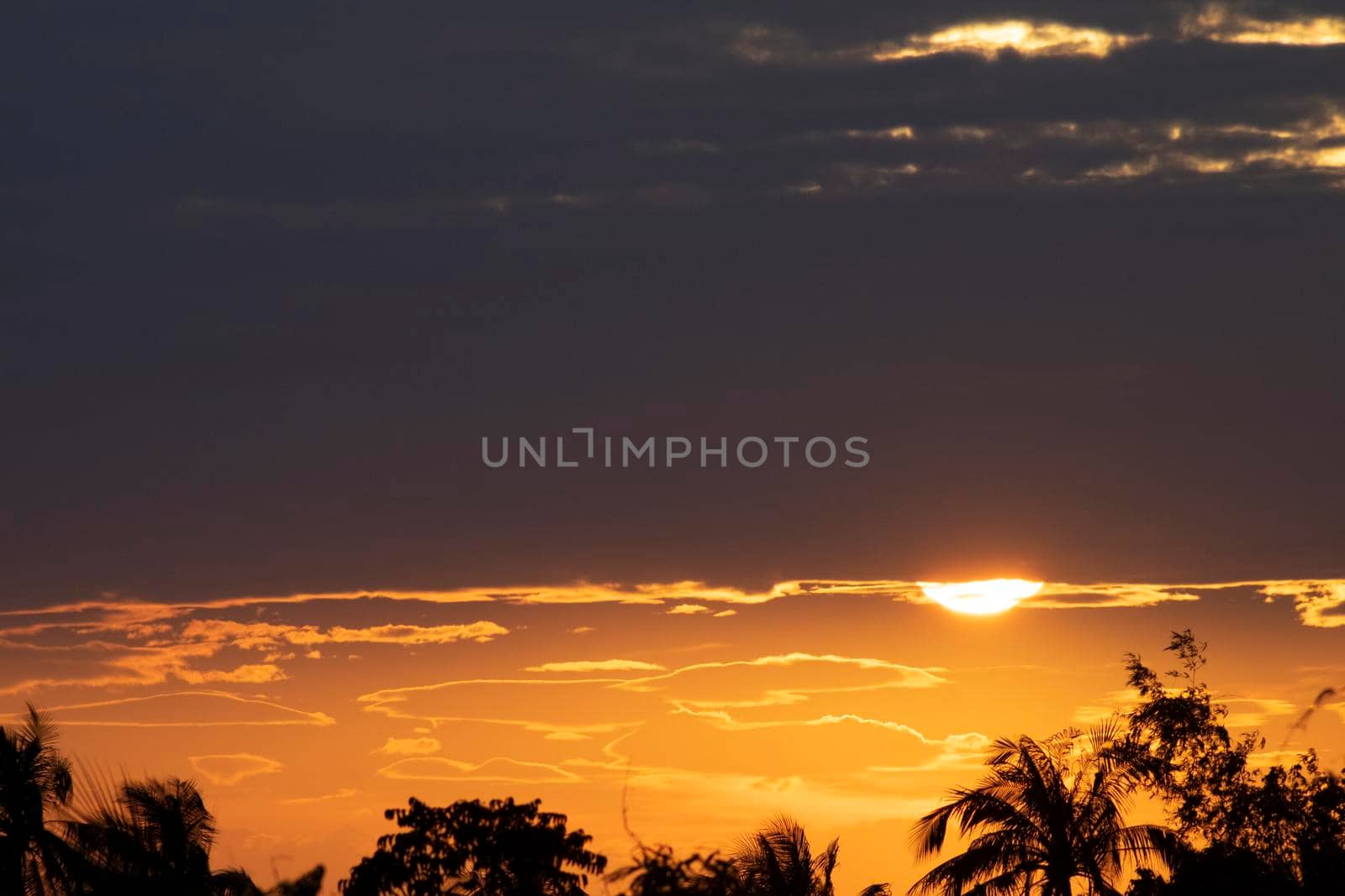 Beautiful sunset sky above clouds orange sunset sky. Beautiful sky. Dramatic red yellow pastel color at sunset.