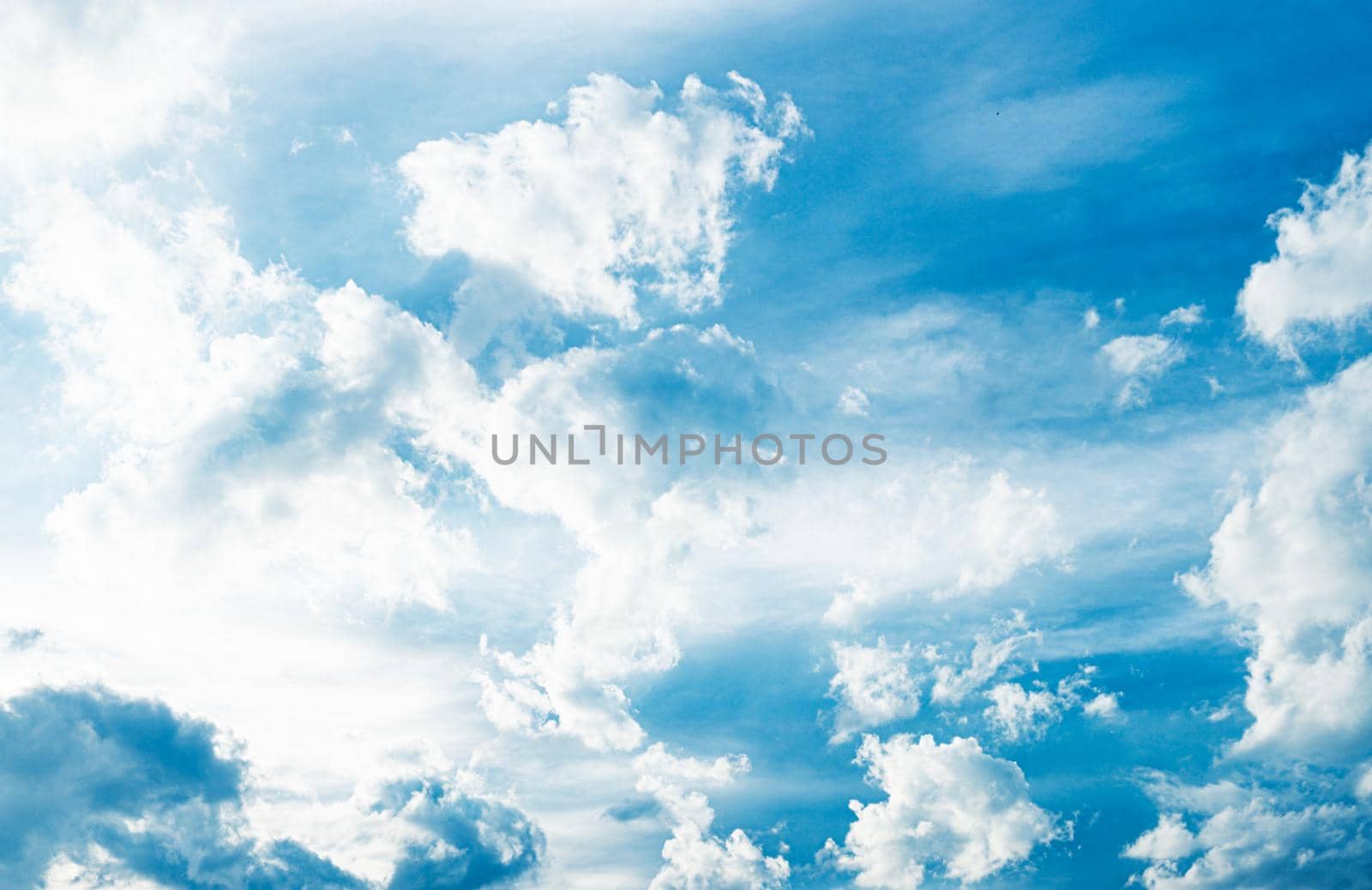 Beautiful white fluffys clouds sky background with blue sky background by Petrichor