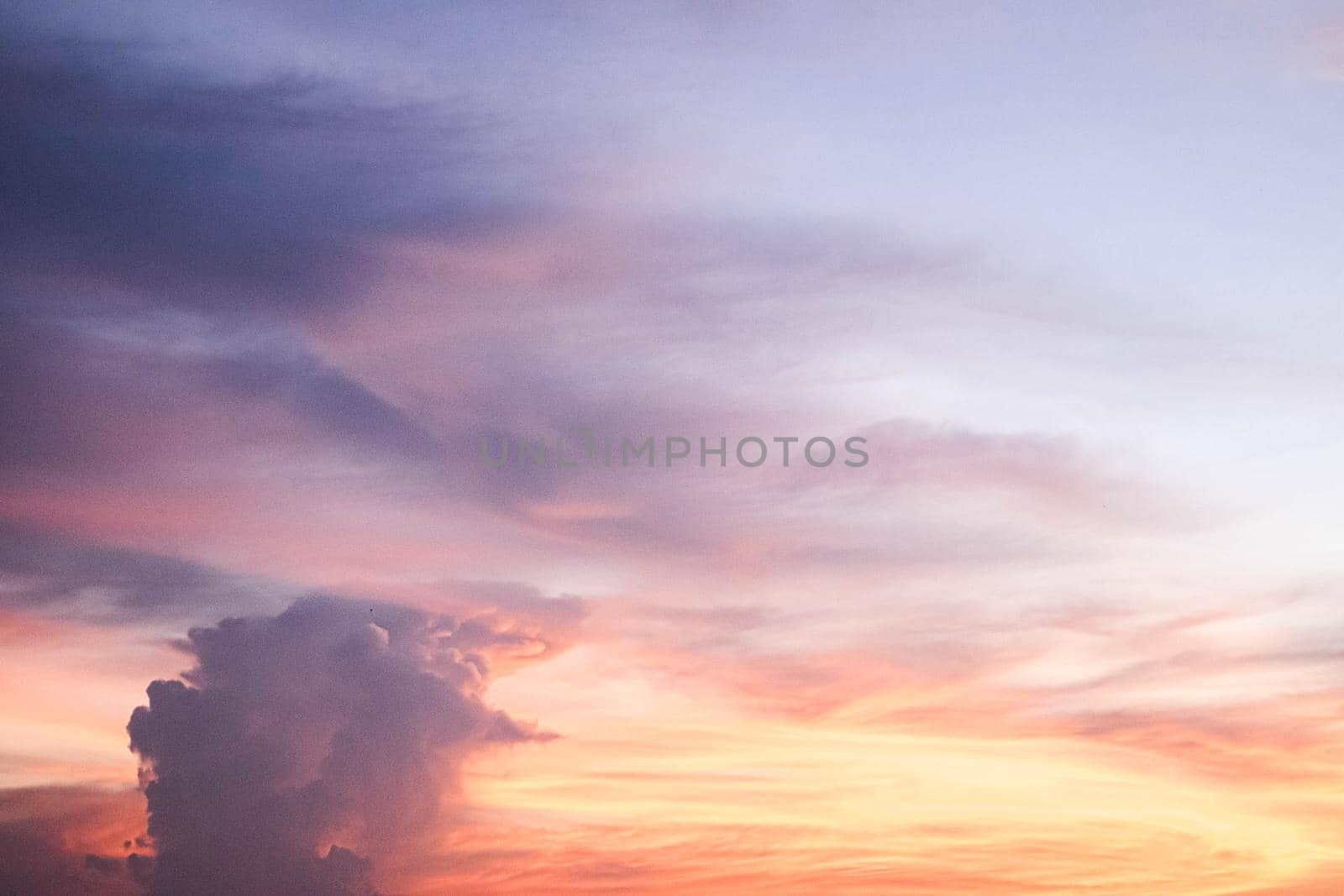 Beautiful sunset sky above clouds.  orange sunset sky. Beautiful sky. Dramatic red yellow pastel color at sunset.