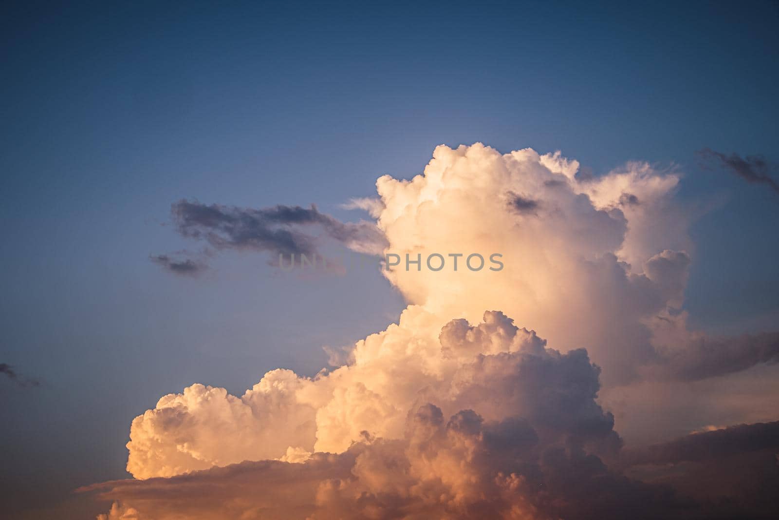 Dark fluffy clouds sky background with blue sky background for copy space. by Petrichor