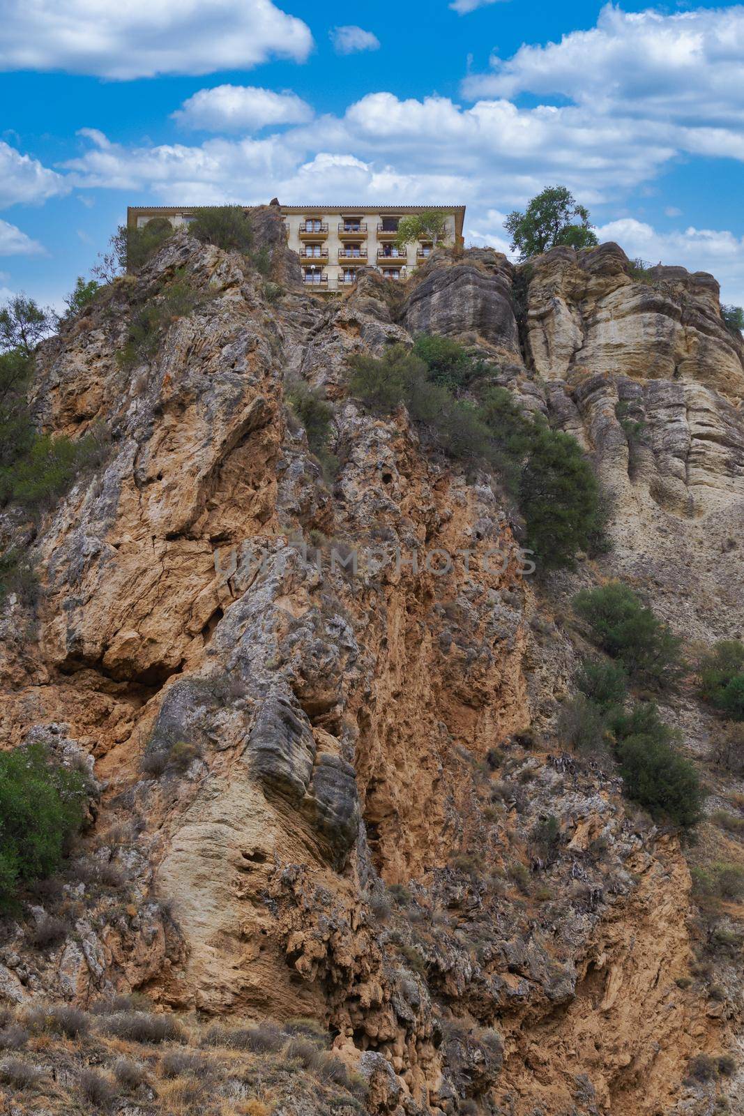 panoramic view of the cliffs of ronda ,malaga,andalucia with the parador at the top