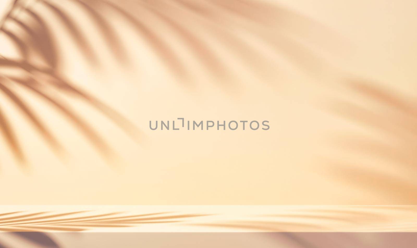 Palm leaf shadow on white wall and cream pastel floor. Abstract background of shadows palm leaf for creative summer minimal mock-up. Neutral tropical palm mockup on light backdrop.Geometric background