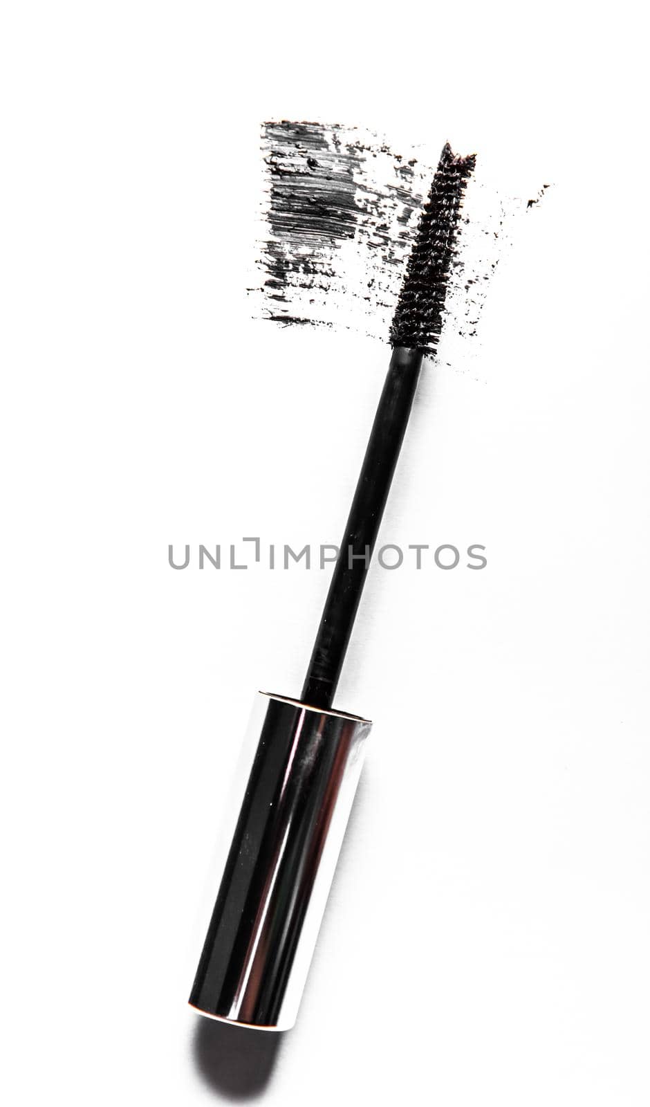 Black mascara brush stroke close-up isolated on white background by Anneleven