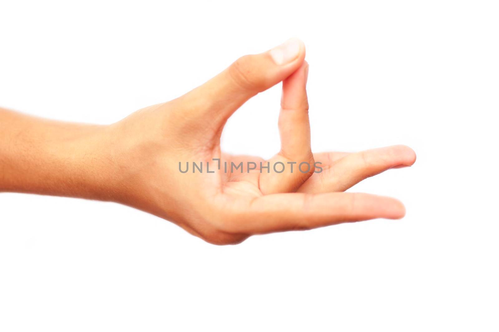 Human hand doing Akash Yoga Mudra isolated on a white-colored seamless background. Shot of single-hand demonstrating Akash Mudra.