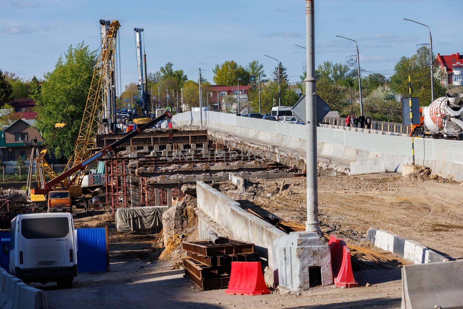 Bridge reconstruction process at summer day in Tula, Russia - April 23, 2022. Telephoto view with narrow angle.