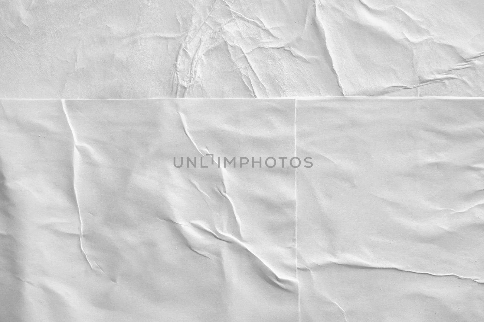 Blank white crumpled and creased paper poster texture background