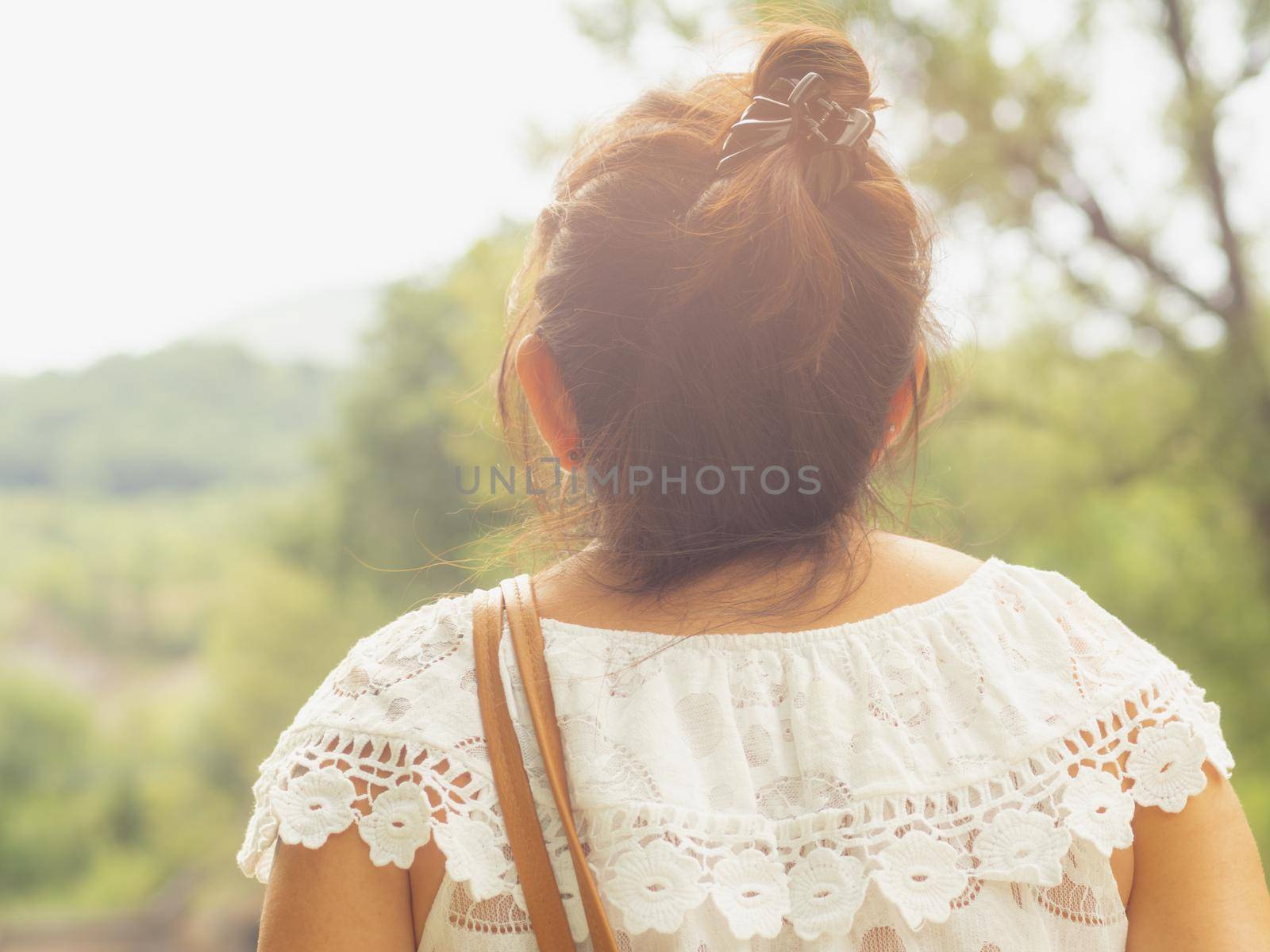 latino hispanic woman enjoying the river a cloudy day
