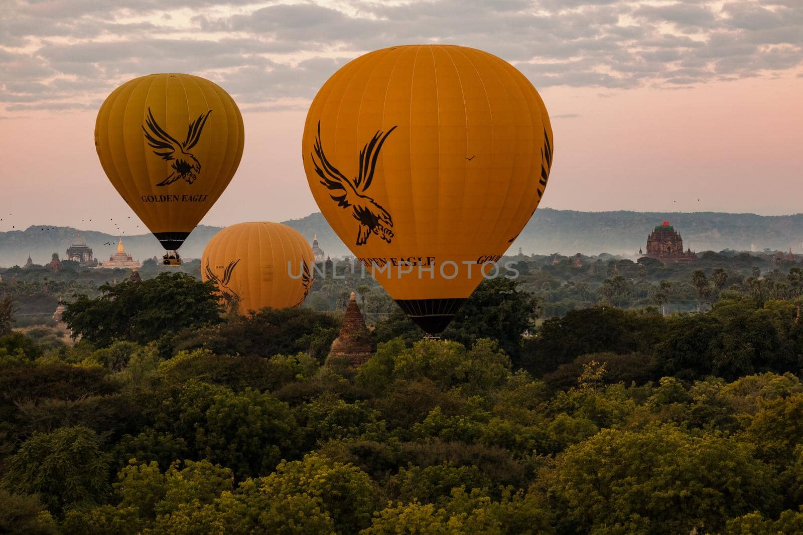 Pre-sunrise balloons over the Bagan World Heritage Site in Myanmar