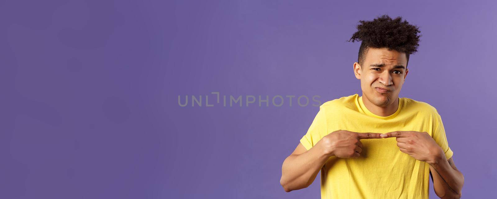 Close-up portrait of shy and modest young silly hispanic man trying say something but being too insecure, grimacing and frowning, look timid, two fingers touching pose, purple background by Benzoix