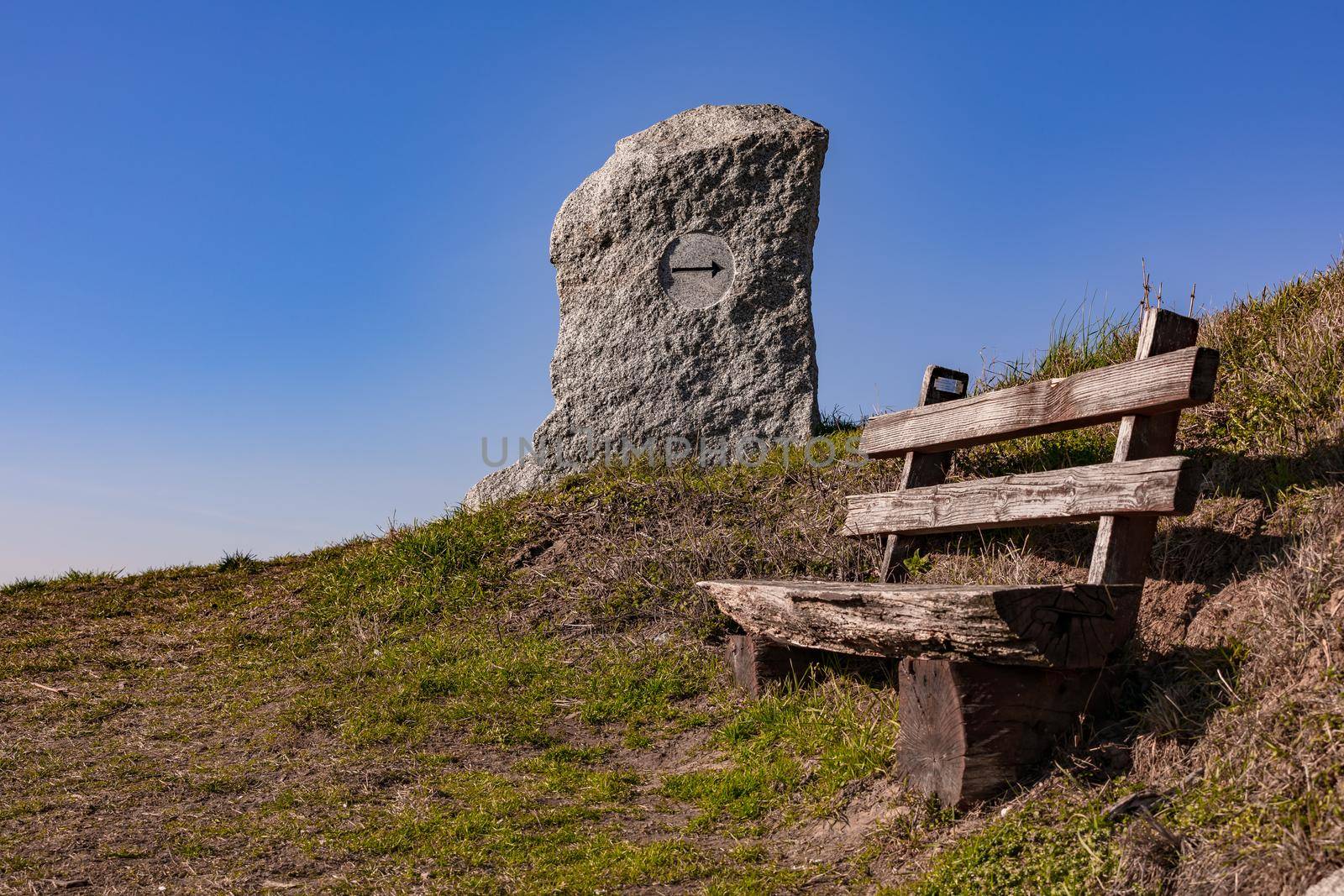 Take a break on a wooden park bench with a great view