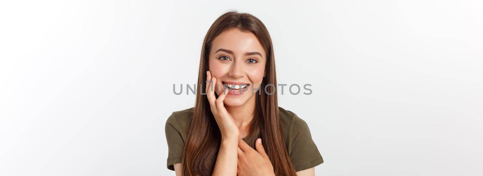 Portrait joyful outgoing woman likes laugh out loud not hiding emotions giggling chuckling facepalm close eyes smiling broadly white background by Benzoix
