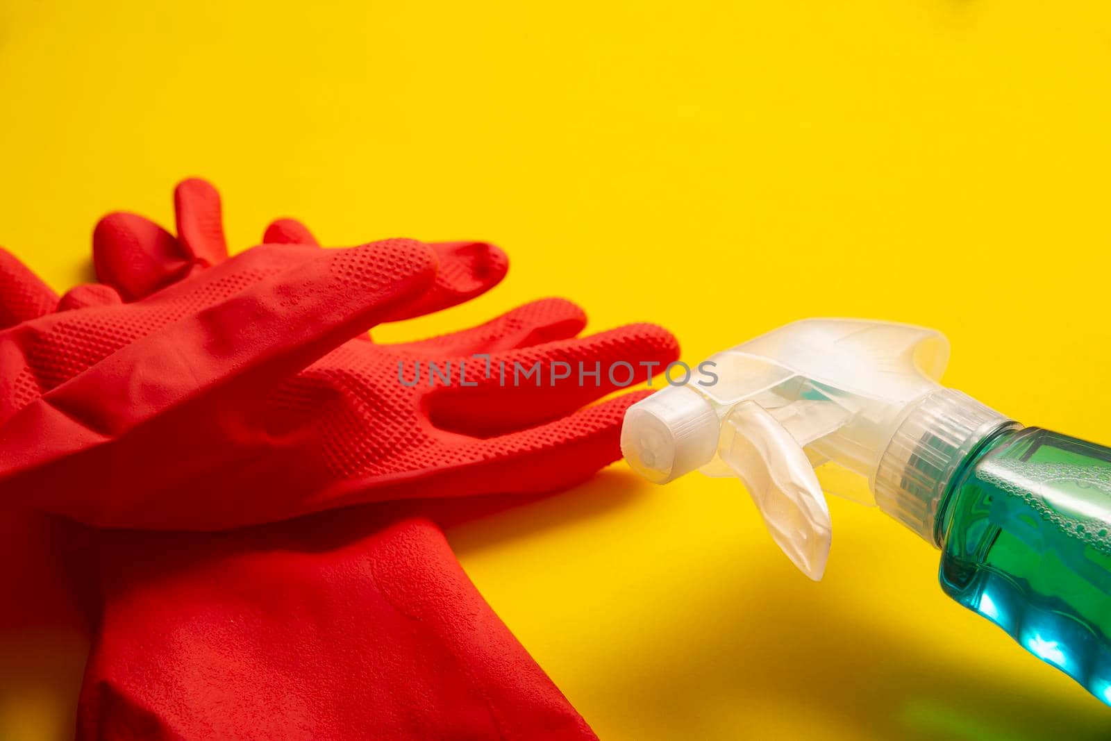 red rubber gloves and liquid by hayaship