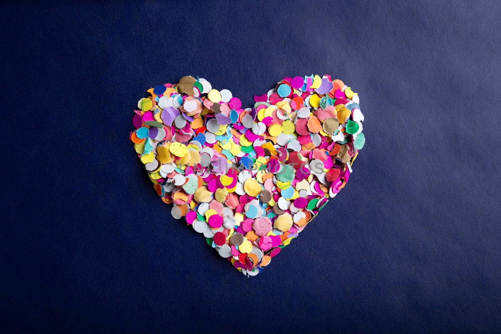 confetti heart on blue by hayaship