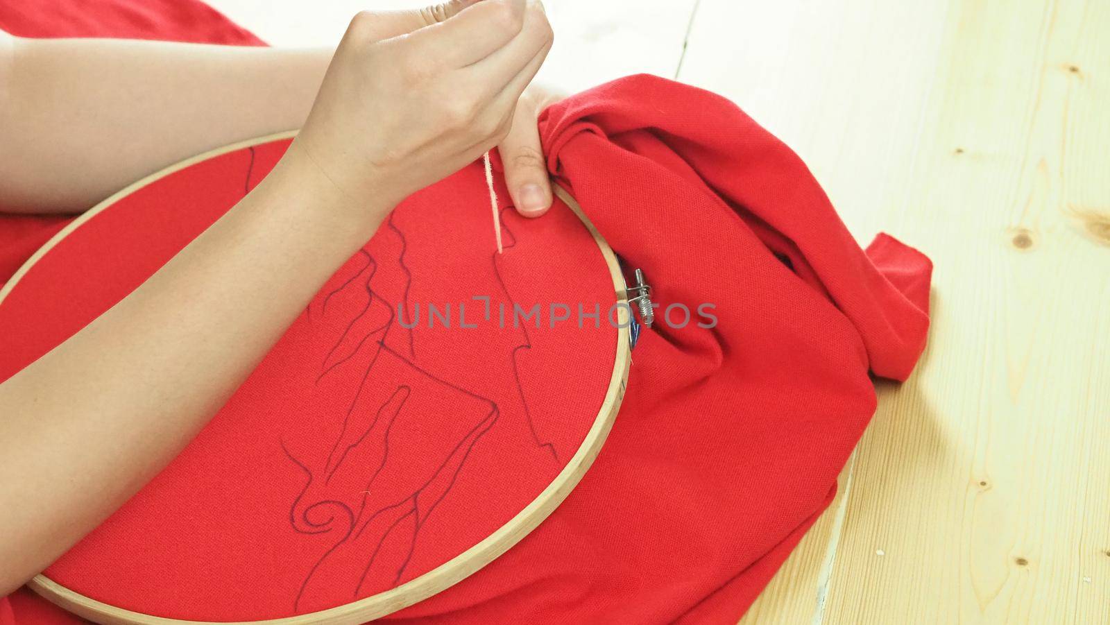 Woman hands and craft work. Embroider sewing by hand. Handicraft work by thread needle sew knit. Wood frame embroidery hoop. Needlework handicraft crafting quarantine leisure concept. 