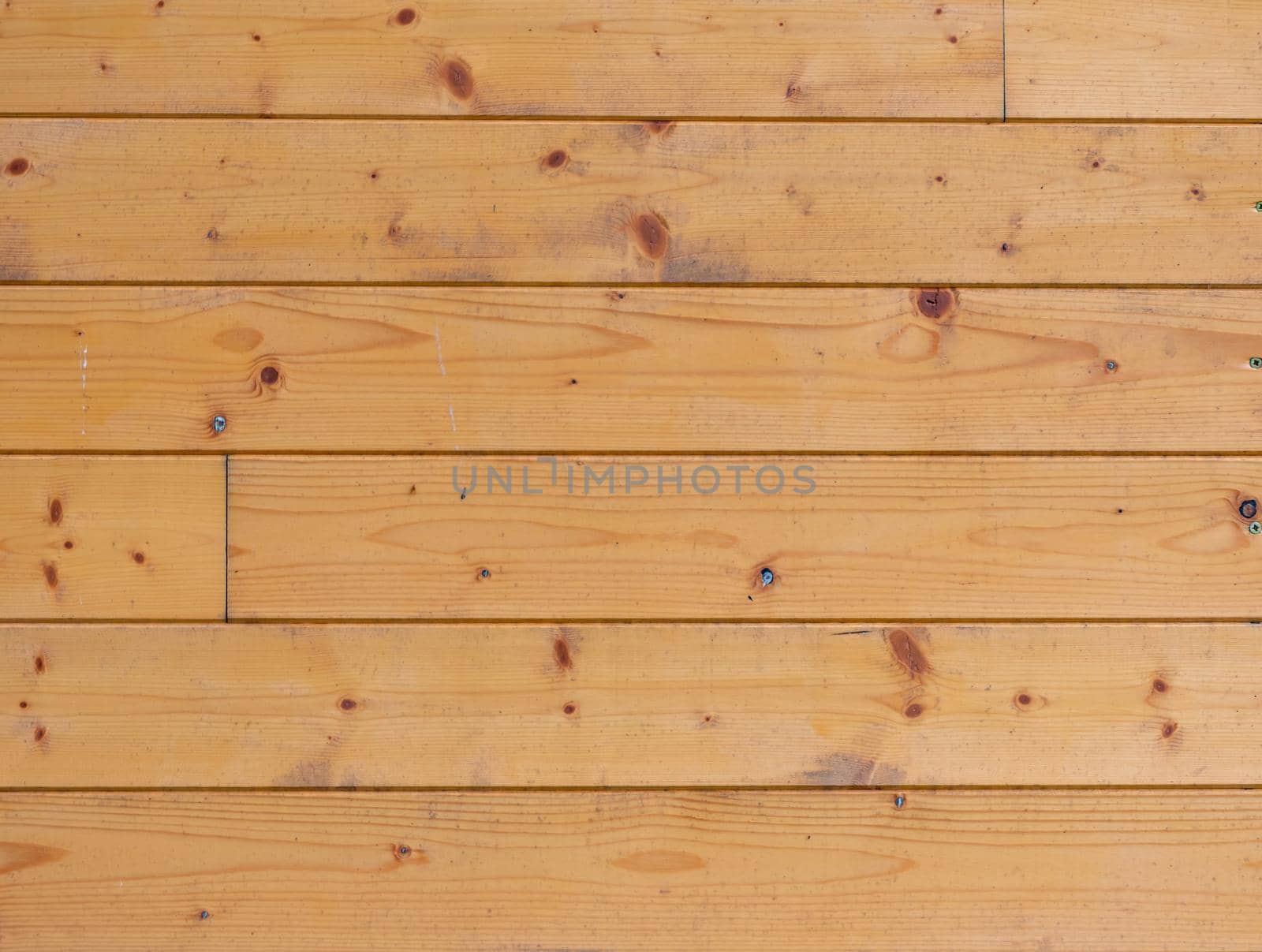 Authentic wood planks in the wall of cabin, texture of spruce wood by rdonar2