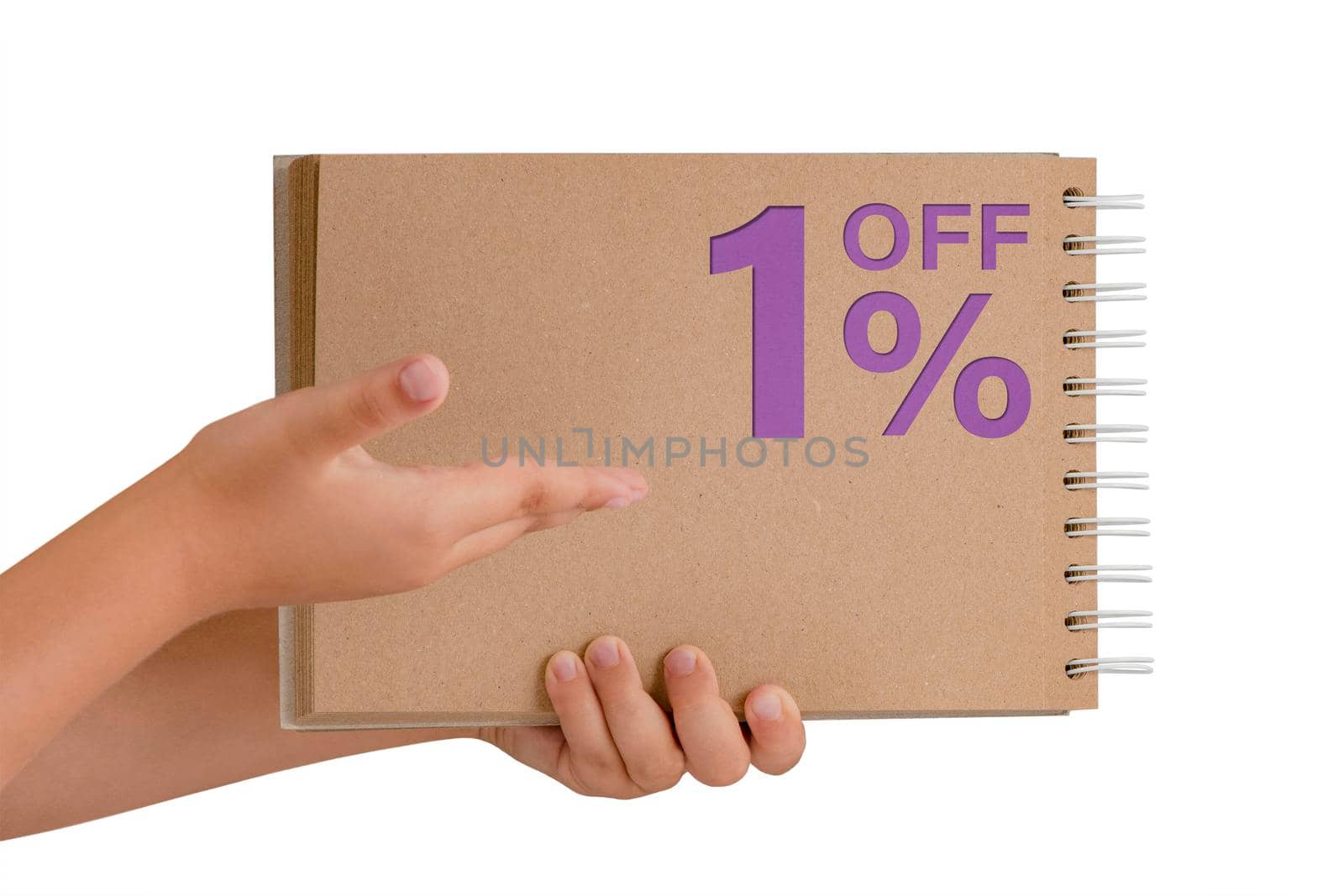 1 percent discount on isolate. Notepad from recycled paper in the hands of a child with text, sale up to 1 percent. The child is holding a notepad demonstrating a big sale