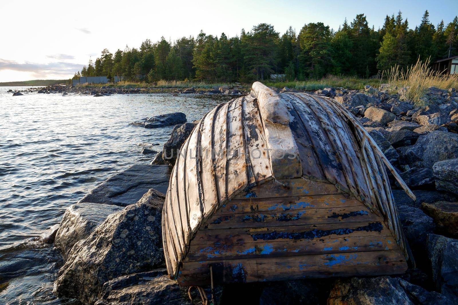 Old fishing boat on rock bay. White sea by RosaJay