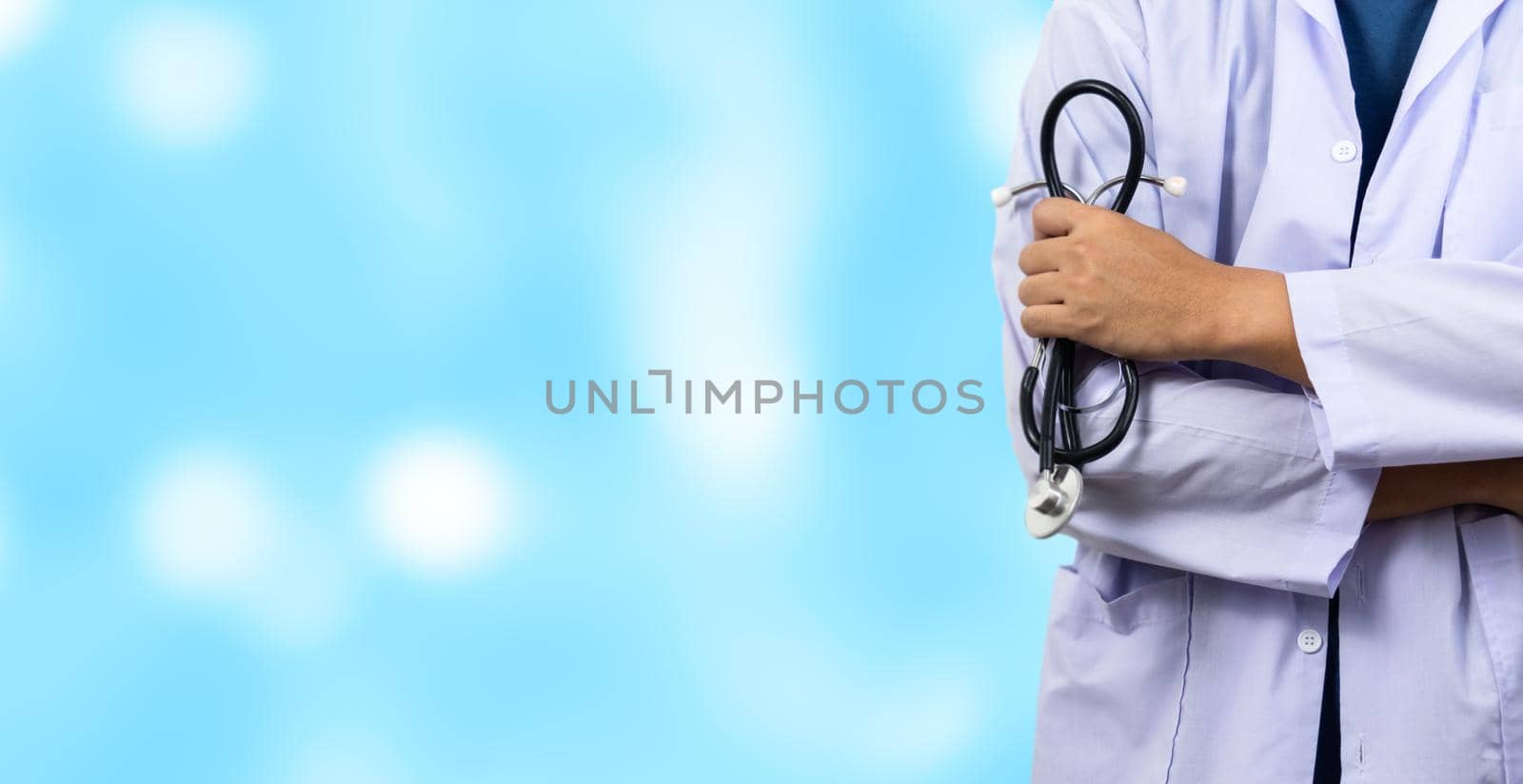 Medicine doctor with stethoscope standing and diagnosis in hospital.Health care and medical or Health Insurance on background concept.