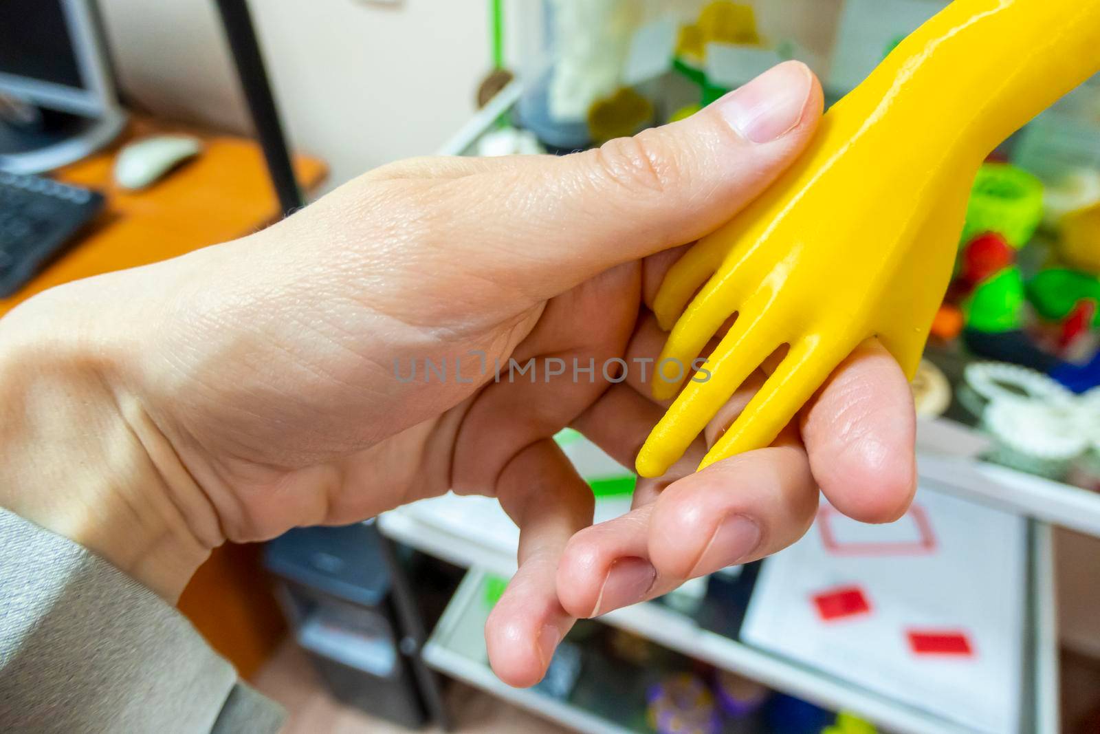 the joy and friendliness of new technologies. 3D printed hand shakes a living hand