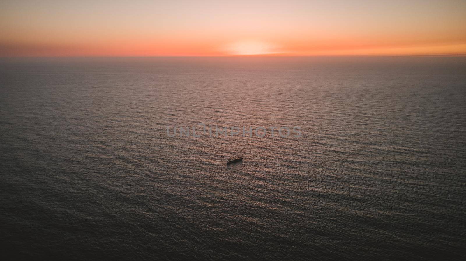 Aerial view os ship in middle of the ocean by fabioxavierphotography