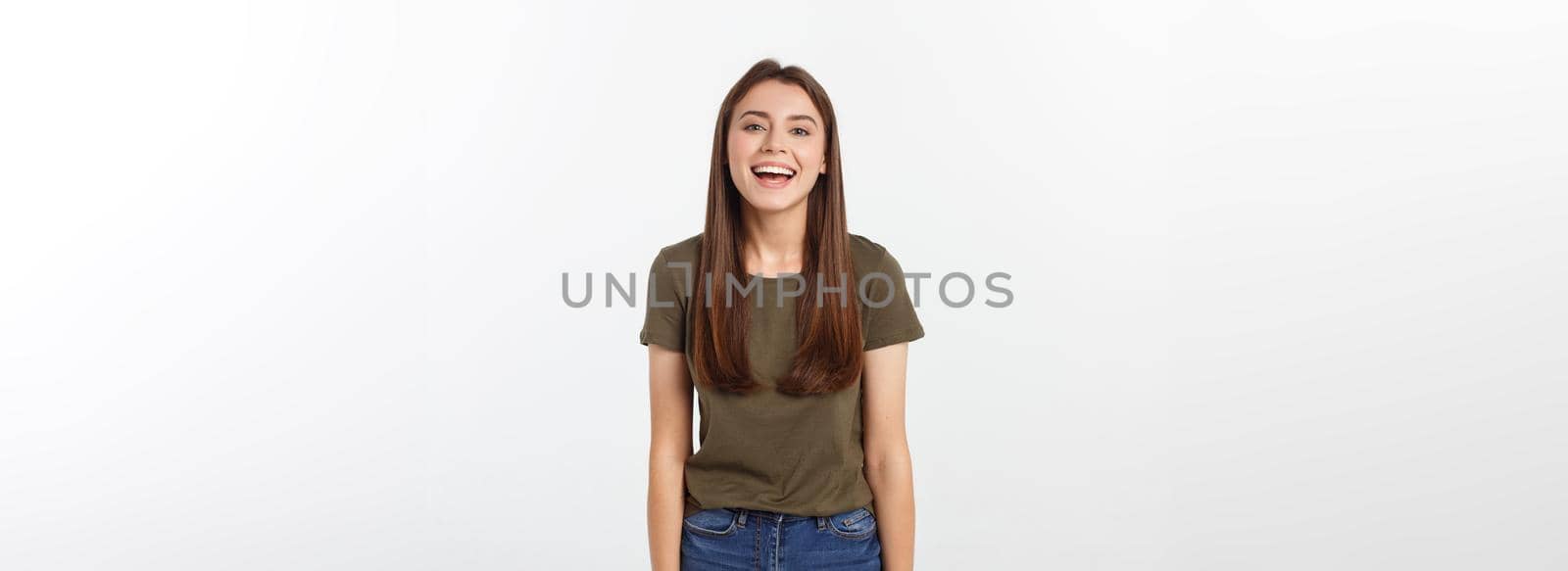 Happy woman Laughing. Closeup portrait woman smiling with perfect smile isolated grey background. Positive human emotion.