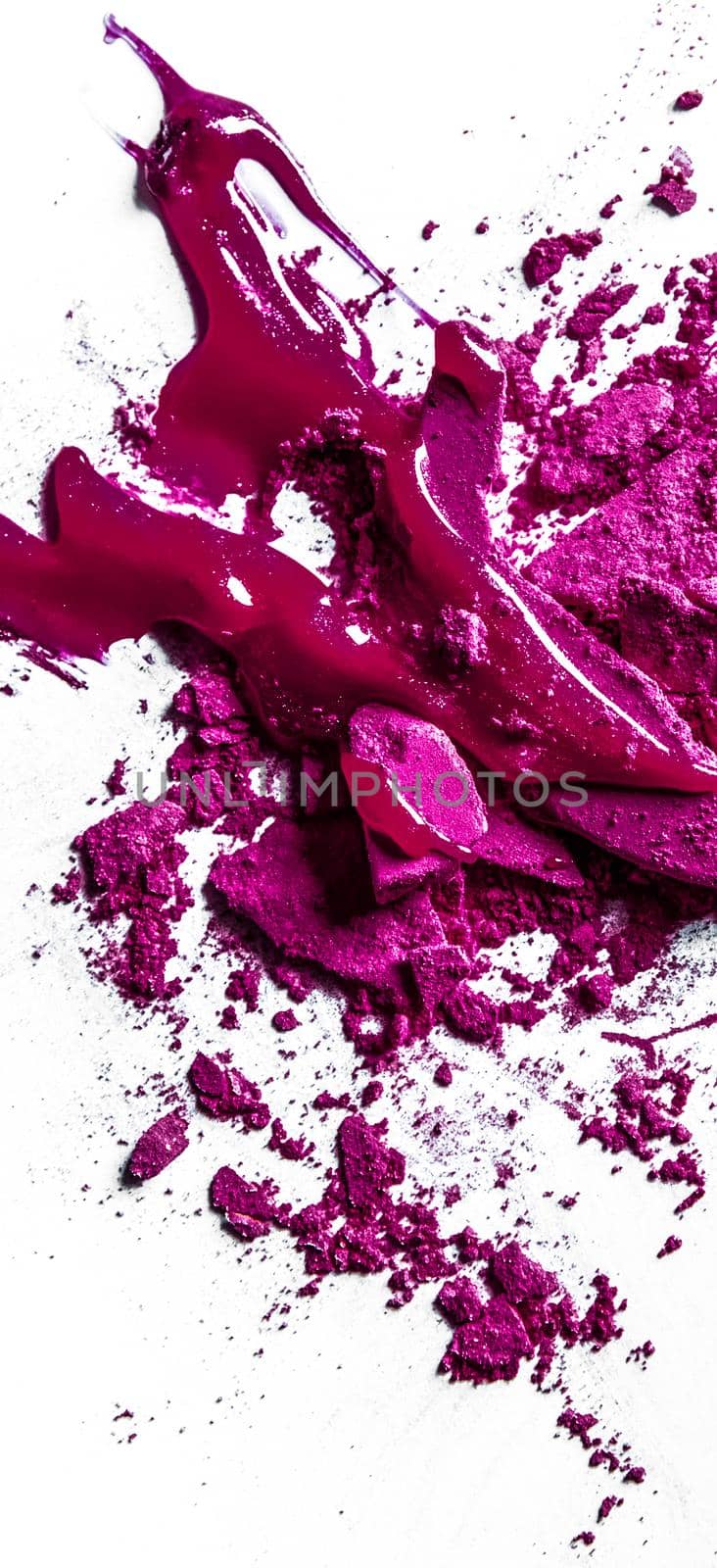 Crushed eyeshadows, lipstick and powder isolated on white background by Anneleven