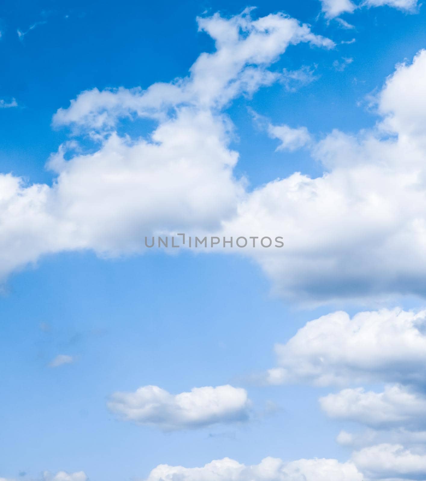 Nature backdrop, solar energy and spiritual concept - Blue sky background, white clouds and bright sunlight