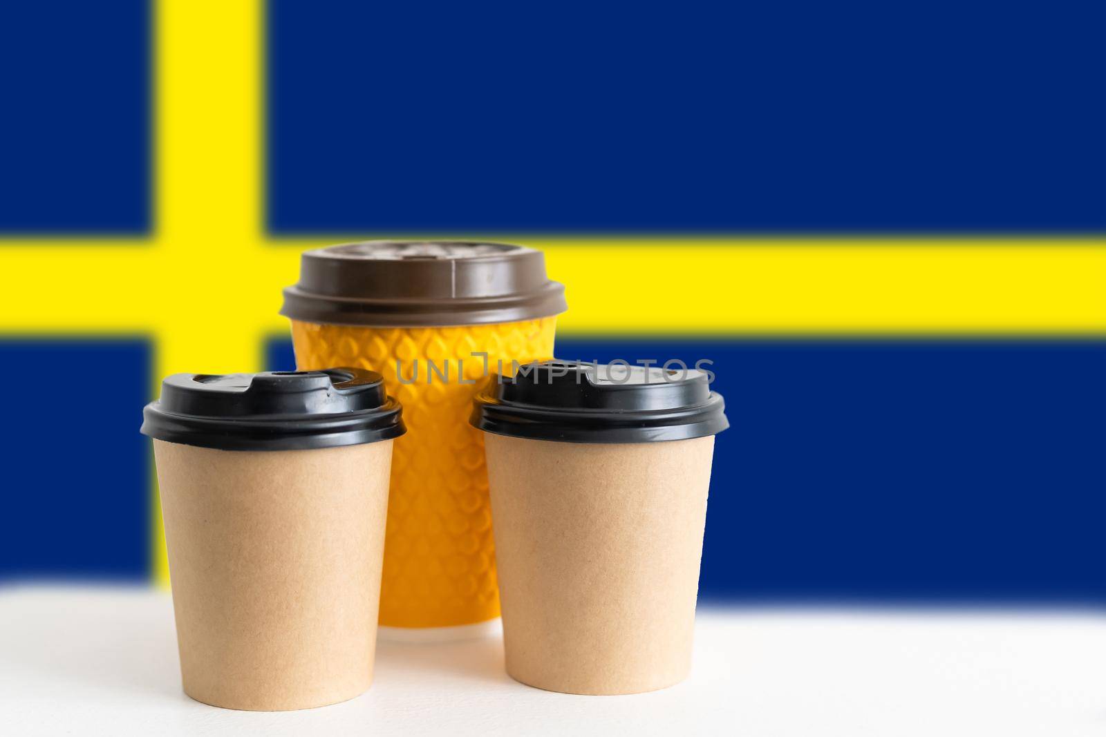 Sweden flag with coffee on table. by Andelov13