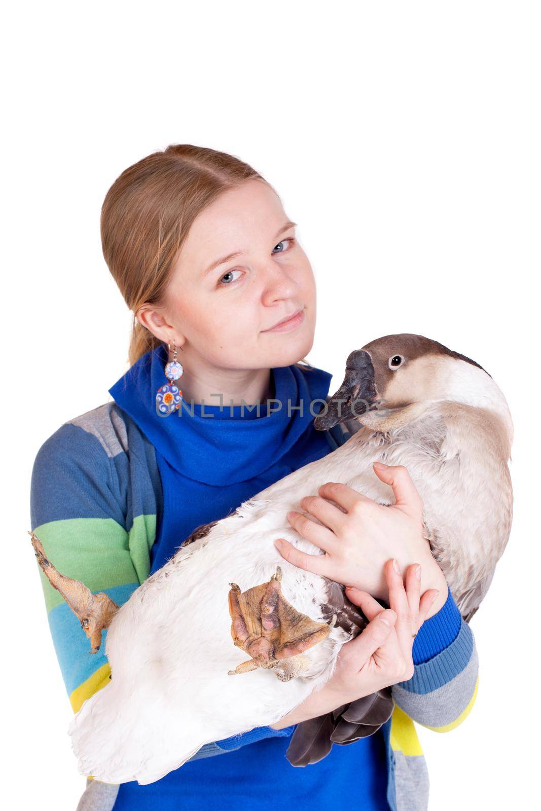 A girl with brown domestic goose isolated on a white background