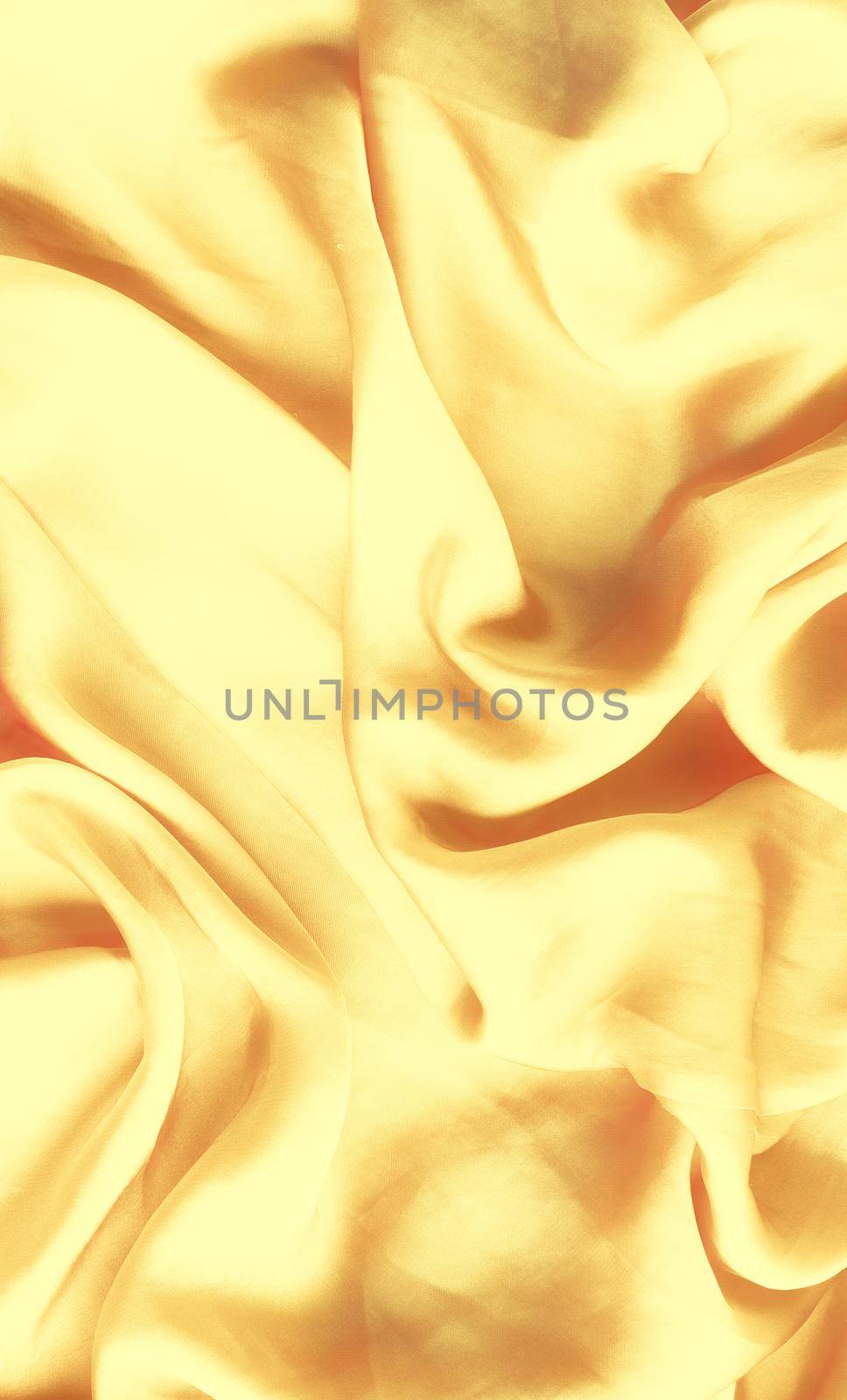 Luxury golden silk background texture - elegant fabric textures, abstract backgrounds and modern pastel colours concept