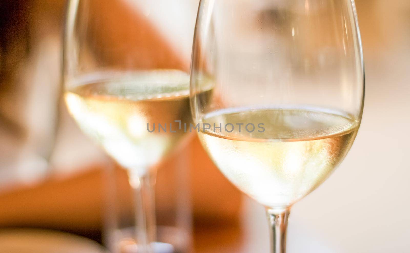 Winery, fine dining and celebration concept - French white wine in a restaurant in Paris, travel experience