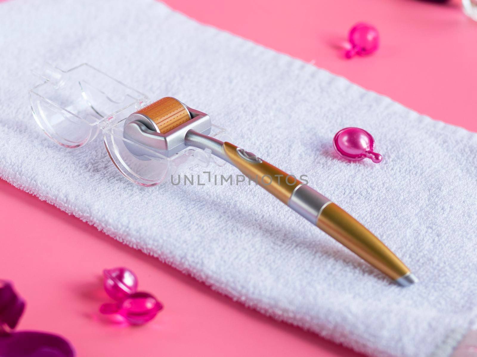 Derma Roller Micro Needle Cosmetic Microdermabrasion Tool For Face.The concept of facial rejuvenation procedures . High quality photo