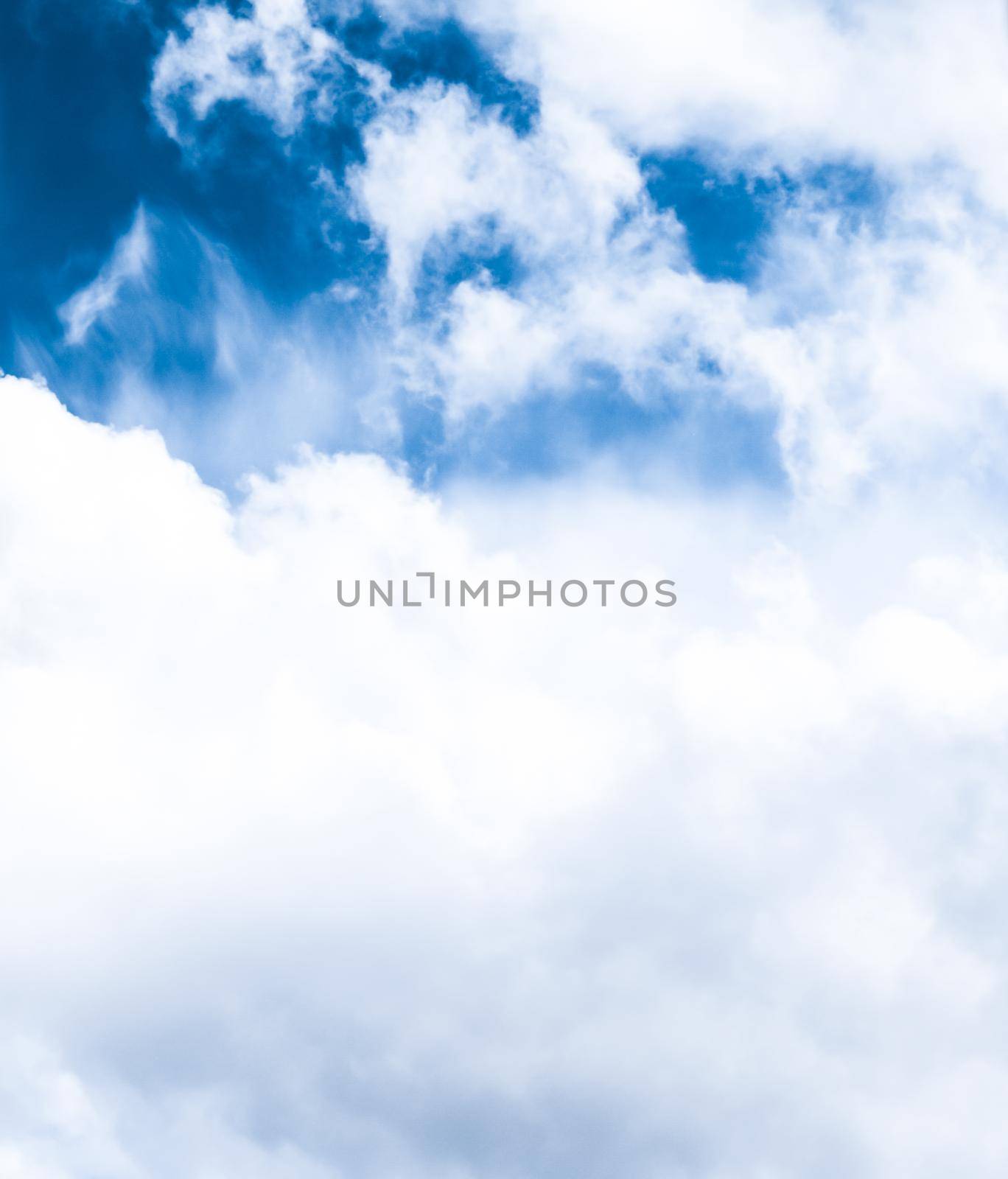 Nature backdrop, solar energy and spiritual concept - Blue sky background, white clouds and bright sunlight