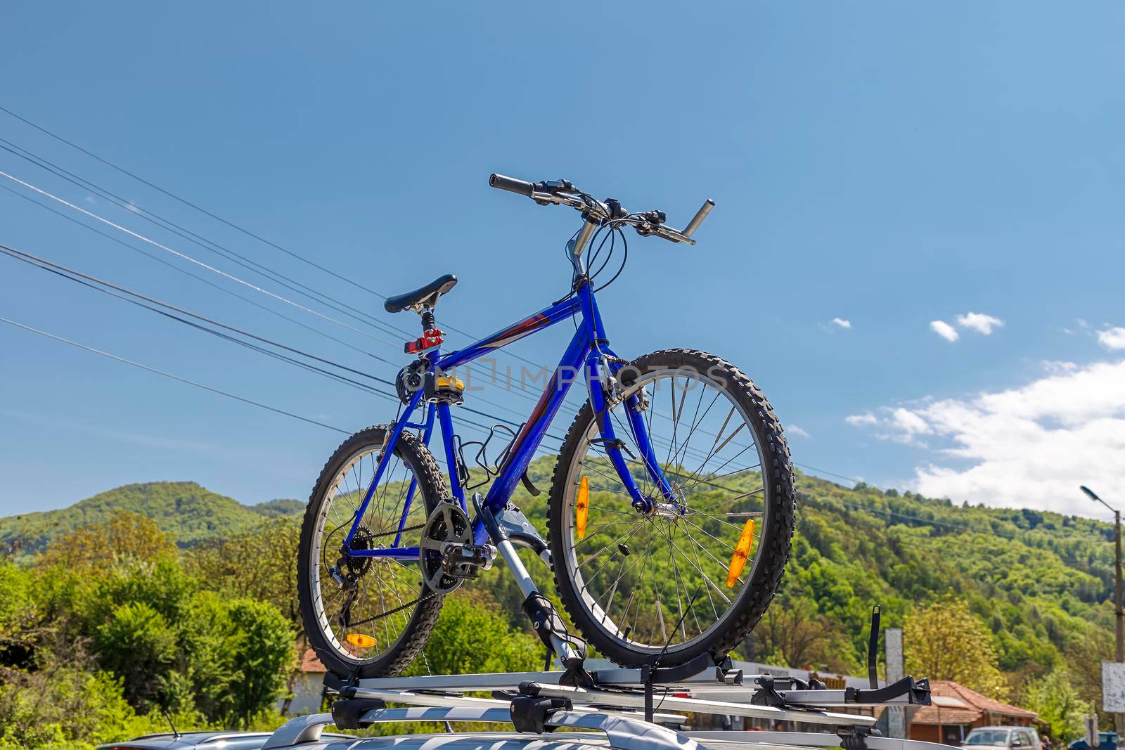 Bicycle roof mount. Transportation of mountain bikes on the roof of the car. 