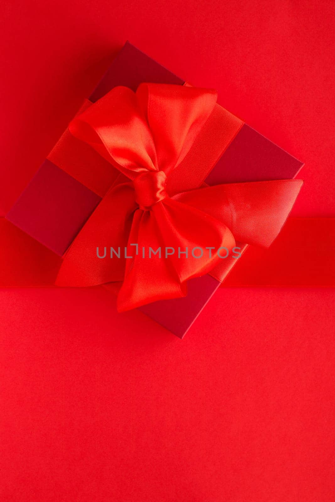 Luxury holiday gifts on red by Anneleven